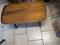 Top view showing wood grain, shape and raised edging