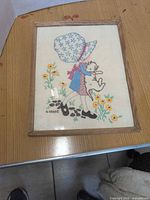 Full view of framed embroidery