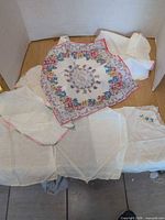 Group of five assorted hankies laid out