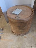 Whole wooden barrel with lid in place