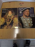 Front covers of both Bellerophon paper doll books