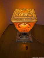 Lamp lit, full view showing height and glow