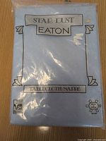 Front of sealed Eaton Star Dust tablecloth package