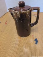 Full view of teapot front showing color and shape