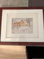 Front view of framed print with mat and frame visible