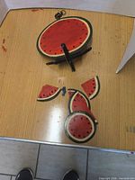 Top view of round watermelon disk and detached slice segments