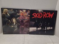 Front jackets of both LPs side by side