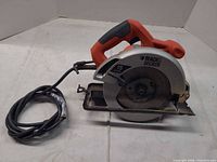 Left side view of Black & Decker circular saw with cord