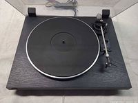 Top view of Dual CS 503-1 turntable with dust cover open