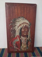 Full view of oil painting on wood panel