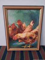 Full view of framed oil painting of chickens