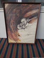 Full view of framed lithograph showing artwork and frame