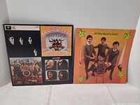 Front cover of booklet and inner gatefold panels of LP sleeve displayed side by side