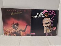 Front covers of both LPs