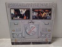 Front gatefold cover showing illustrated tour bus and album title