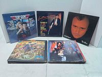 Five LPs: Top Gun, La Bamba, Phil Collins, Elton John, Heart