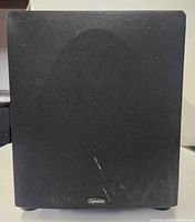 Front view showing grille and logo