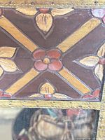 Close-up of mirror frame floral motif