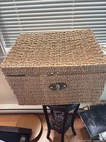 Closed wicker lidded basket