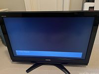 Front view of Toshiba REGZA 37" LCD TV powered on displaying "No Video Signal" message