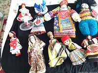 All ten dolls laid out for full group view