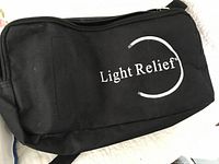Light Relief branded carrying bag