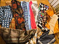 All 14 scarves laid out showing variety