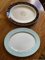 Both platters together on wooden surface