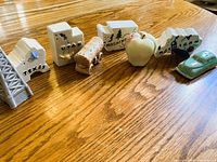 All eight shakers lined on table