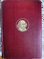 Front cover showing red leather texture and gilt Shakespeare portrait