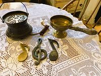 All five pieces laid out on table lace cloth