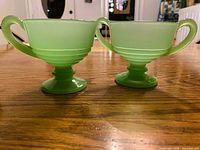 Both jadeite pieces side-by-side, full view