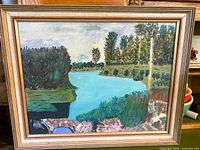 Front view of framed oil painting showing entire artwork and frame