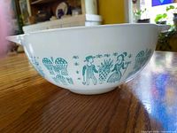 Side view showing Amish Butterprint design and Cinderella handle