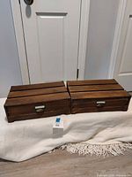 Pair of wood monitor stands with drawers closed, front view