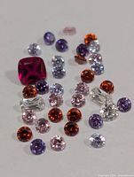 All loose cubic zirconia stones arranged on white background