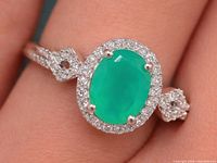 Front view of ring displaying green onyx and CZ halo