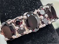 Top view showing garnet arrangement and silver prong setting