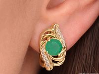 Earring on ear showing size and color of stones