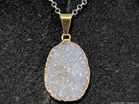 Front close-up of druzy agate/quartz pendant on chain
