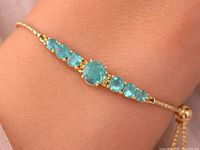 Bracelet on wrist showing gemstone arrangement and finish