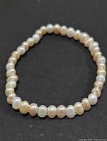 Full view of pearl stretch bracelet showing all beads