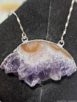 Front view of silver necklace with purple quartz druzy pendant
