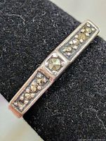 Front view showing marcasite panel and silver band