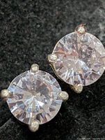 Close-up of both cubic zirconia studs front view