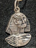 Front view of silver pharaoh pendant head