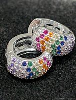 front view of both silver CZ multicolour hoop earrings