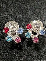 front view of both earrings showing stones and design
