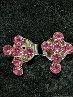 Front view of both earrings showing stone arrangement