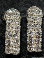 Front view of both earrings showing rhinestone arrangement
